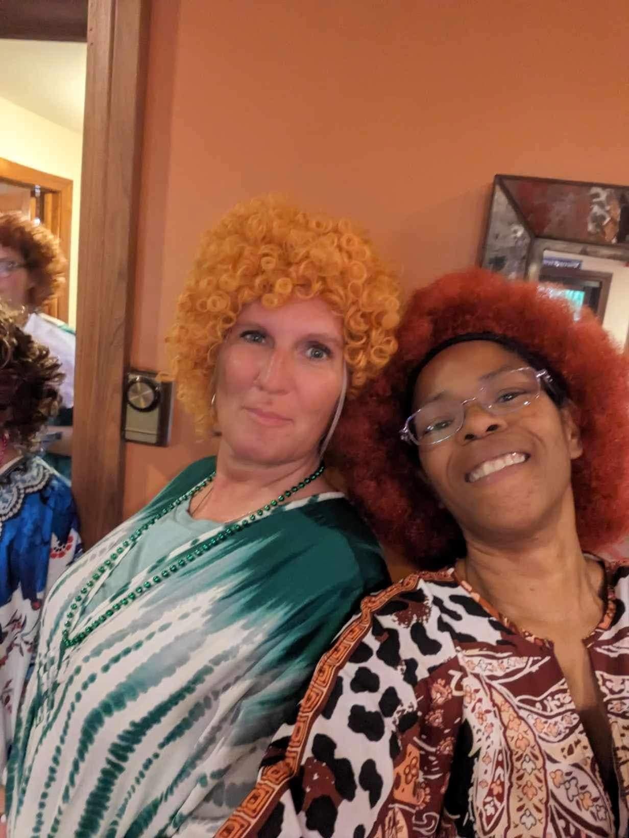 Nurse Traci and Becky in Mrs. Roper costumes at a staff employee appreciation event